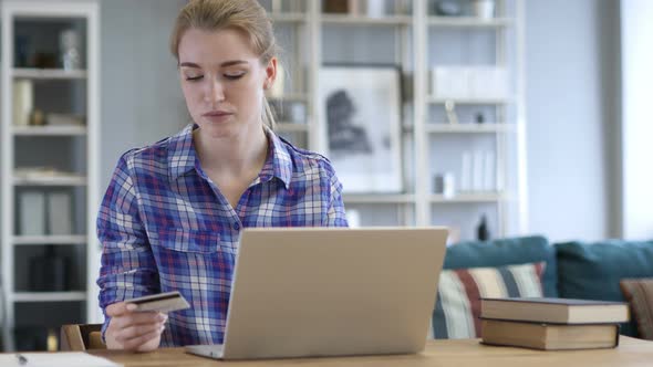 Young Woman Shopping Online on Laptop, Credit Card