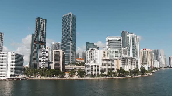 Beautiful wide aerial view of Brickell waterfront downtown Miami 4K