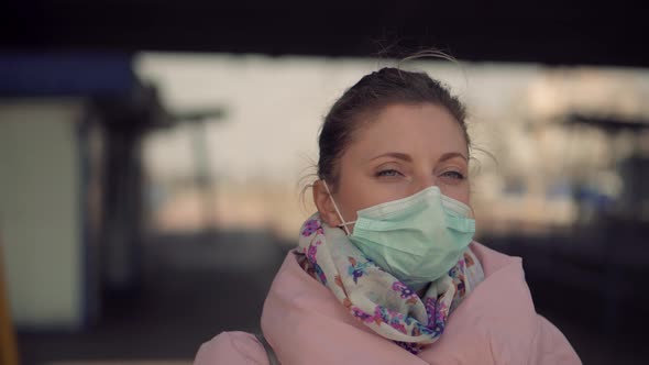 Girl Waiting Tram Wearing Protective Mask COVID19 Virus. Health And Safety Concept. Mask Protection.