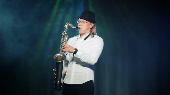 Man Playing the Saxophone on Stage