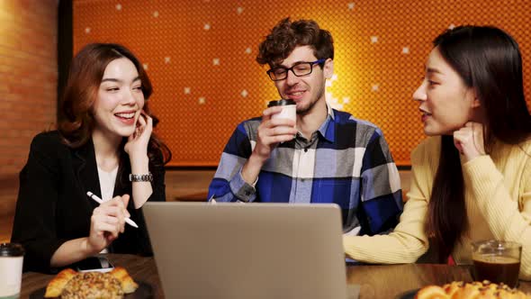 young asian woman and caucasian man Business people Working discuss