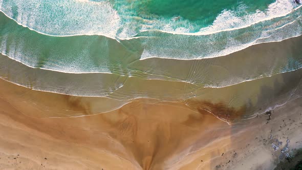 Aerial view of scenic sunset over Purakaunui Bay, New Zealand.