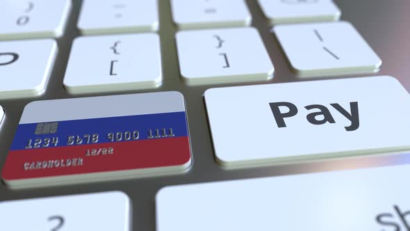 Bank Card Featuring Flag of Russia As a Key on a Keyboard alt