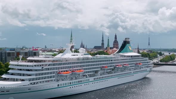 Beautiful Cruise Ship Docked in Riga Latvia Near the Old Town and the Bridge