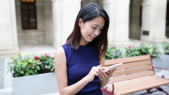 Woman using mobile phone