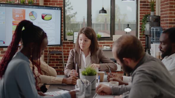 Diverse Group of Workmates Discussing Business Strategy