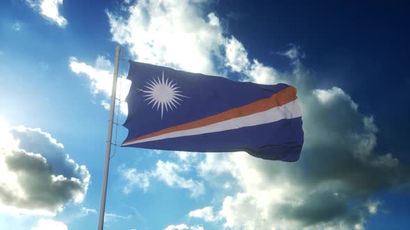 Flag of Marshall Islands Waving at Wind Against Beautiful Blue Sky