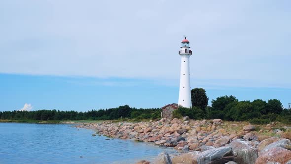 Beautiful Lighthouse Near the Sea in a Small Village in Clear Weather