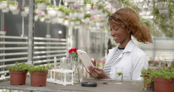 Female Researcher Technician Studying with a Tablet