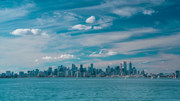 Australia Victoria Melbourne City look from Williamstown Blue sky with high rise buildings and sail