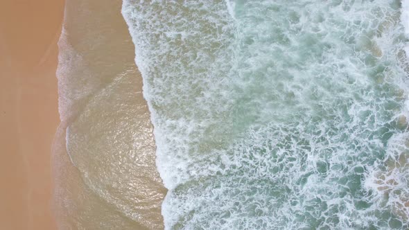 Sea summer Beautiful waves Foaming and Splashing on the beach sand. Ocean sea. Beautiful waves