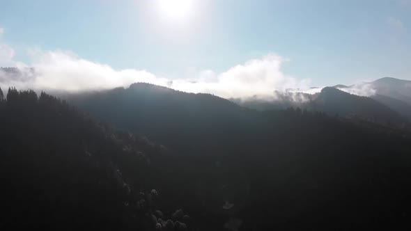 Aerial View of Dawn Over the Mountains. Fog and Clouds Hovered Mountain Tops