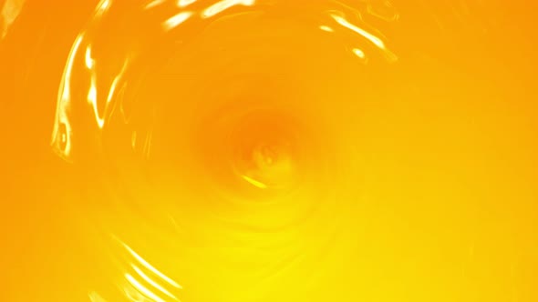 Super Slow Motion Shot of Orange Juice Whirl at 1000 Fps