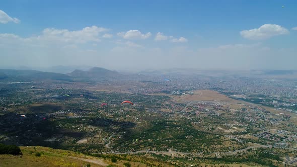 Crowd Paragliding In The Sky