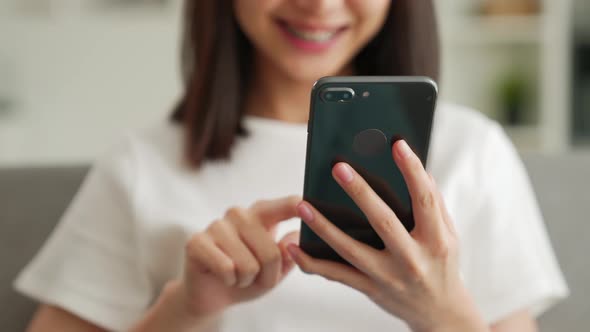 Woman using smartphone, During leisure time