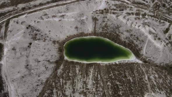 Aerial drone view a green lake formed on phosphogypsum waste