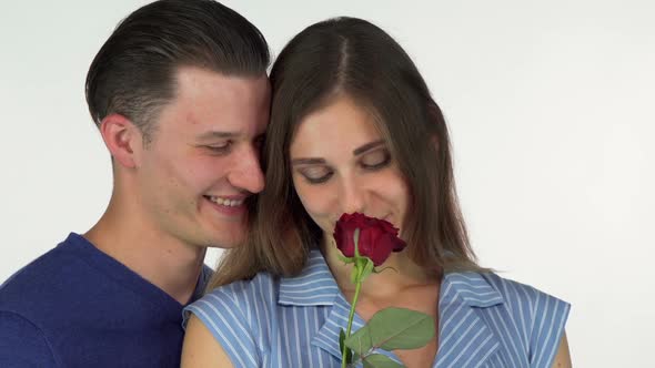 Gorgeous Woman Smelling the Rose Her Boyfriend Giving Her 1080p