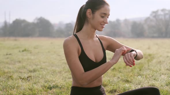 Girl Doing Yoga Exercises Outdoors.