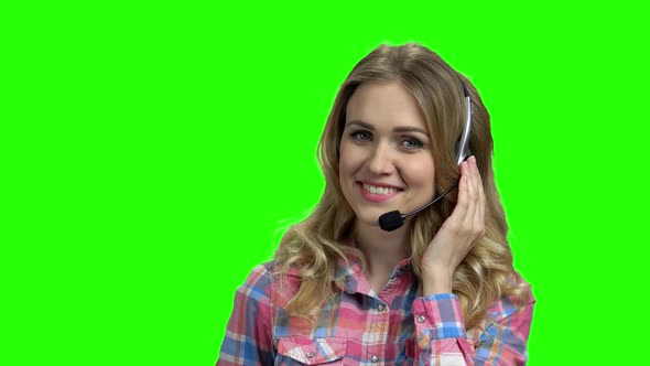 Portrait of Beautiful Call Center Operator on Green Screen