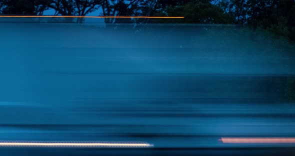 Timelapse of Highway Traffic by night with Speeding Cars