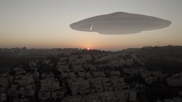 Alien Spaceship Ufo hovering over city at sunset - aerial view
