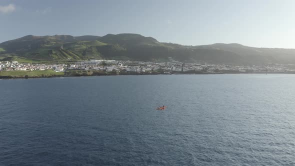 Aerial view of people doing kayak at Ilheu da Vila, Azores, Portugal.