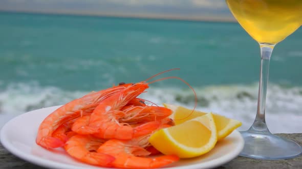 Delicious Shrimps with Wine on the Ocean Coast