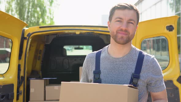 The Courier Delivers the Parcel and Hand It to the Client