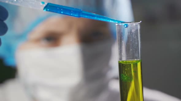 Lab Technician Does a Patient Urine Test