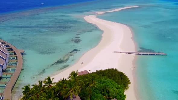 Drone panorama of exotic resort beach by blue lagoon and sand background