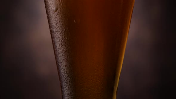 Drops of Water on Glass of Beer