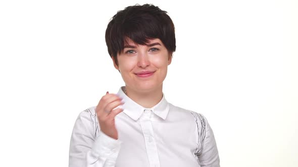 Caucasian Pretty Woman Giving Hand Kiss Isolated Over White Background in Slow Motion