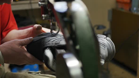 the Process of Repairing Shoes on an Old Mechanical Fully Manual Typewriter