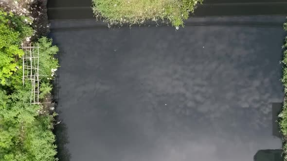 Aerial view above of an extremely polluted river, Cambodia.