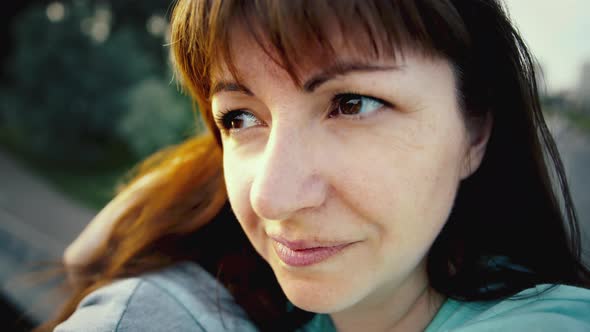 Portrait of a Happy Woman in Nature Looking Around Woman Enjoying a Summer Day Cinematic