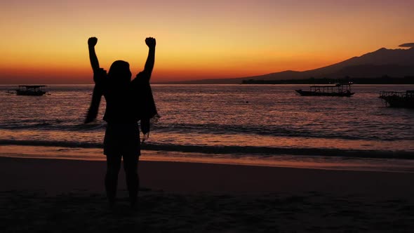 Tourist loves life on tranquil coastline beach voyage by transparent water with white sand backgroun