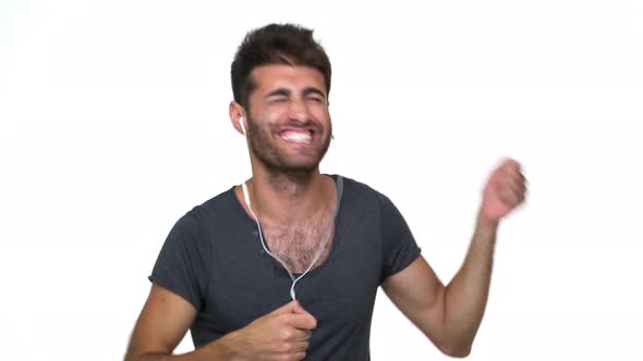 Caucasian Happy Energetic Guy Emotionaly Listening to Favourite Music Dancing Shouting Smiling with