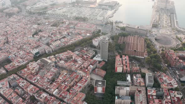 Drone shot over Barcelona la Rambla and port