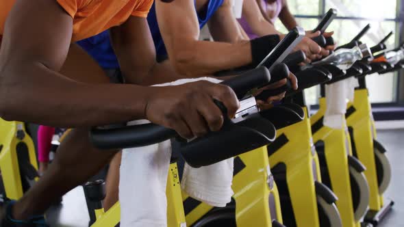 Working out on exercise bikes at a gym