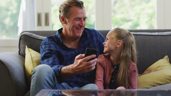 Grandfather and granddaughter spending time together