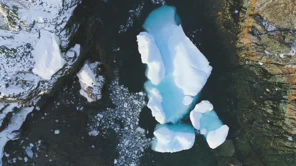 Iceberg Stuck in Peninsula Ocean Shore Aerial View