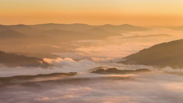 Misty Dawn in the Mountains. Beautiful Autumn Landscape