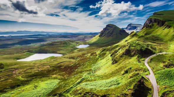 Dynamic sky over valley in mountain Quiraing, Scotland, United Kingdom, 4k, timelapse