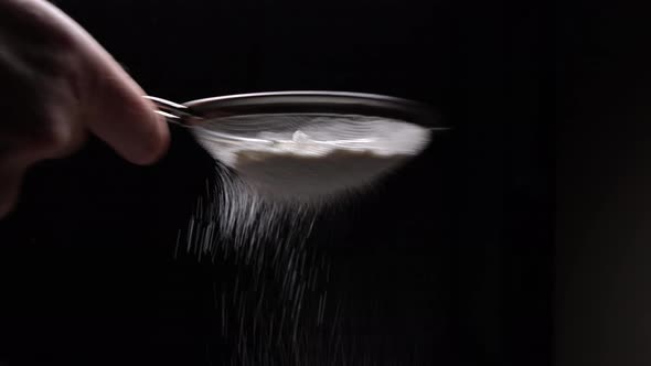 The Chef Sifts Flour Through A Sieve To Prepare Dessert