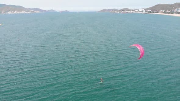 Kite Surfing Place, Sports Concept, Healthy Lifestyle, Human Flight. Aerial View of the City Beach