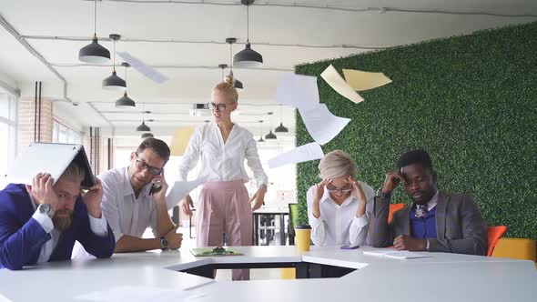 Angry Unbalanced Female Boss Scream Scolds Employees for Not Fulfilling the Plan at Work