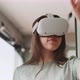 Young woman touching ahead of her with hands while in vr goggles - VideoHive Item for Sale