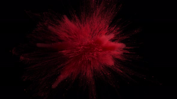 Red Powder Explosion on Black Background