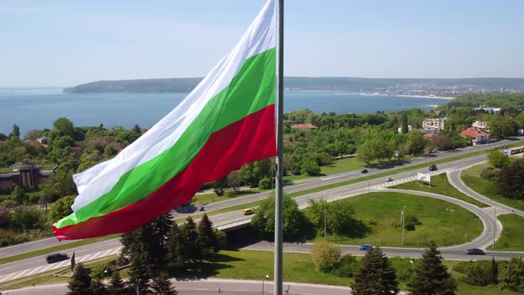 Bulgaria Flag Against City Varna at Summer Day