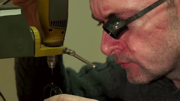 Watchmaker Makes Perforation in Some Watch Piece